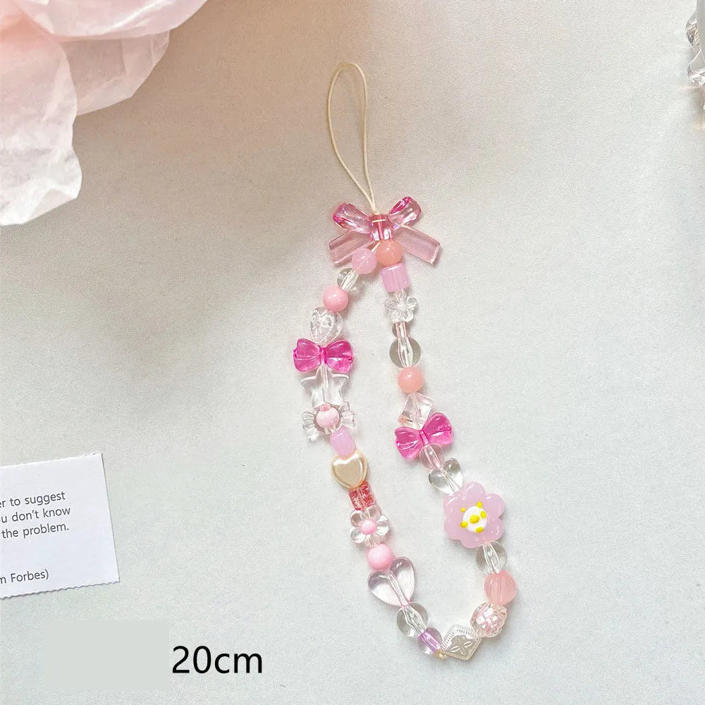 Colourful beaded flower mobile phone lanyard with hand rope and decorative floral elements