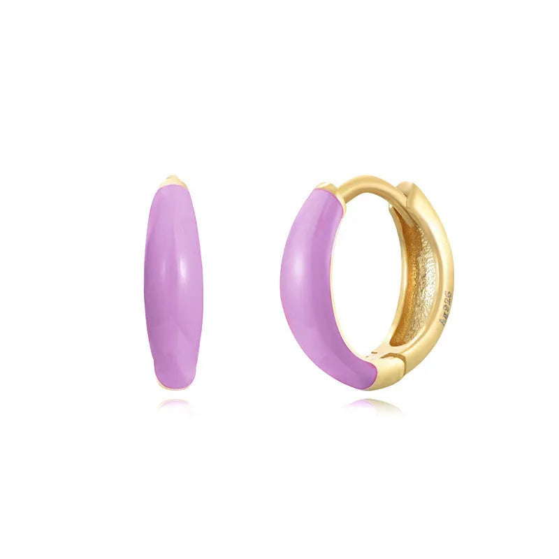 Geometric U-shaped silver wire drop earrings with glossy oval epoxy resin elements in various colours.