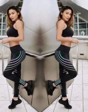 Women's high-waist workout leggings with glowing night print in black and white colours