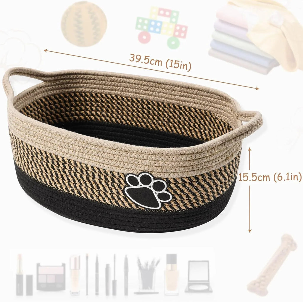 Small light beige handwoven cotton rope storage basket with wooden elements and handle
