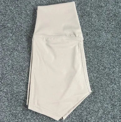 Ladies high-waisted yoga shorts in nylon fabric, shown in one of 16 available colours.