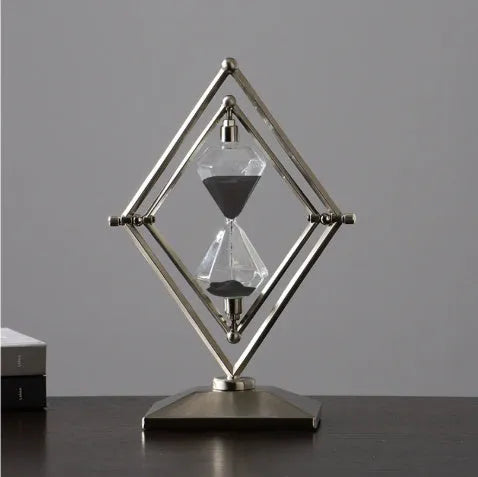 Zinc alloy metal and glass sand timer ornament with modern minimalist design in bronze or silver colour