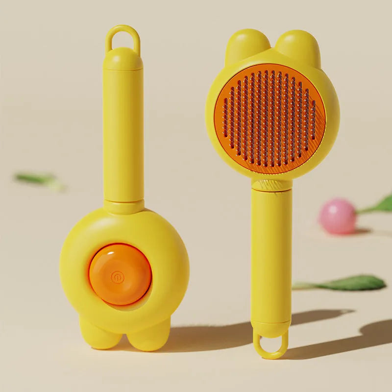 Green self-cleaning pet grooming brush with a stainless steel comb and a comfort-grip handle.
