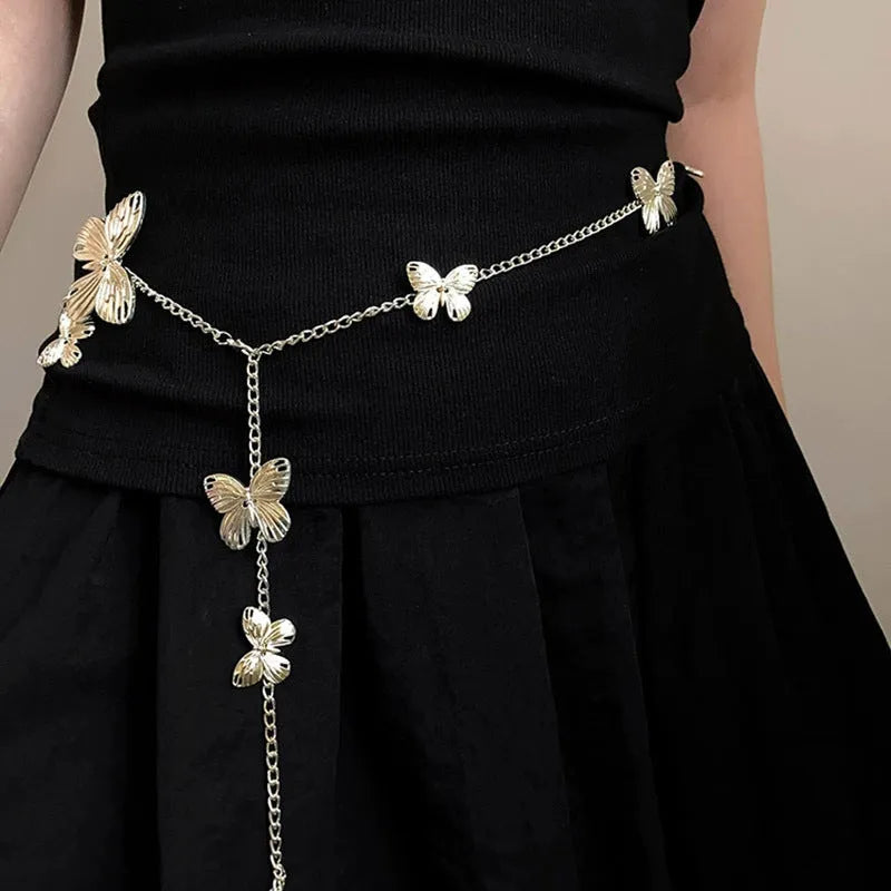 Women's gold butterfly waist chain alloy accessory with 104cm length on model