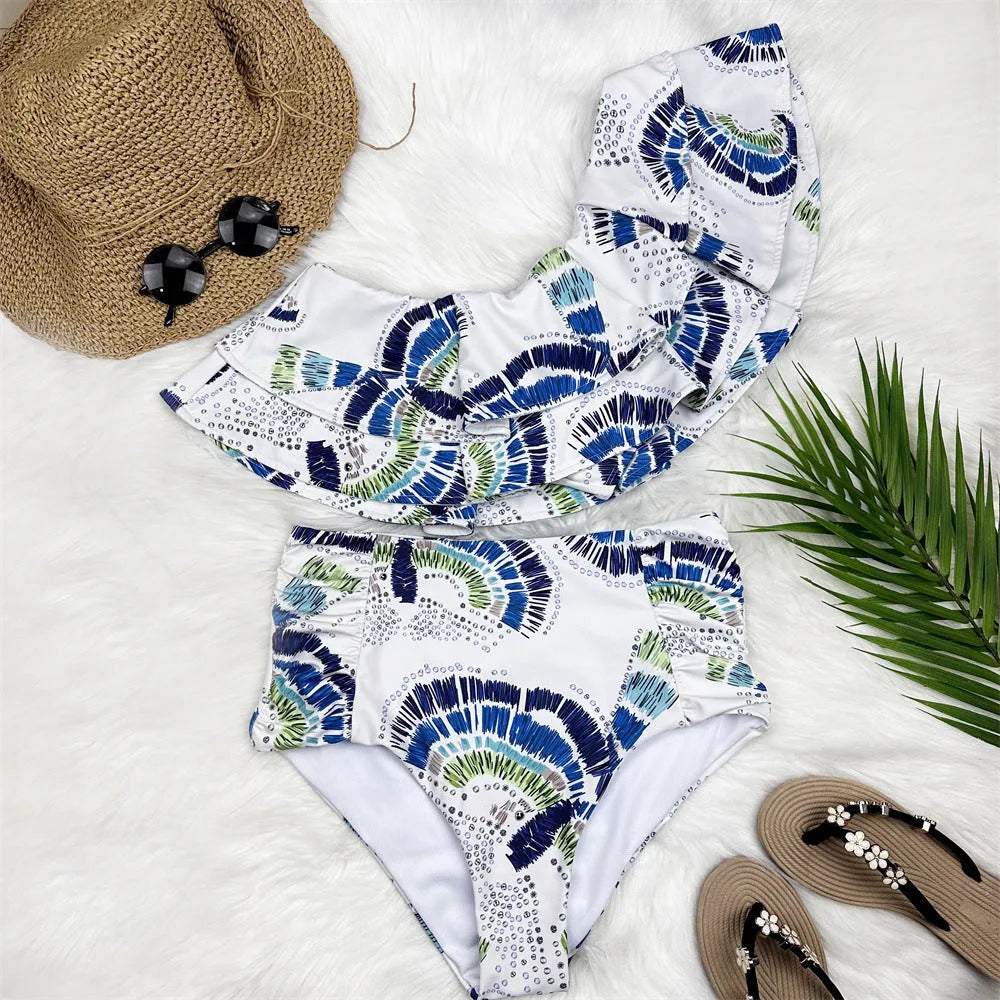 White women's one-shoulder swimsuit with double-layer construction and lotus leaf detailing