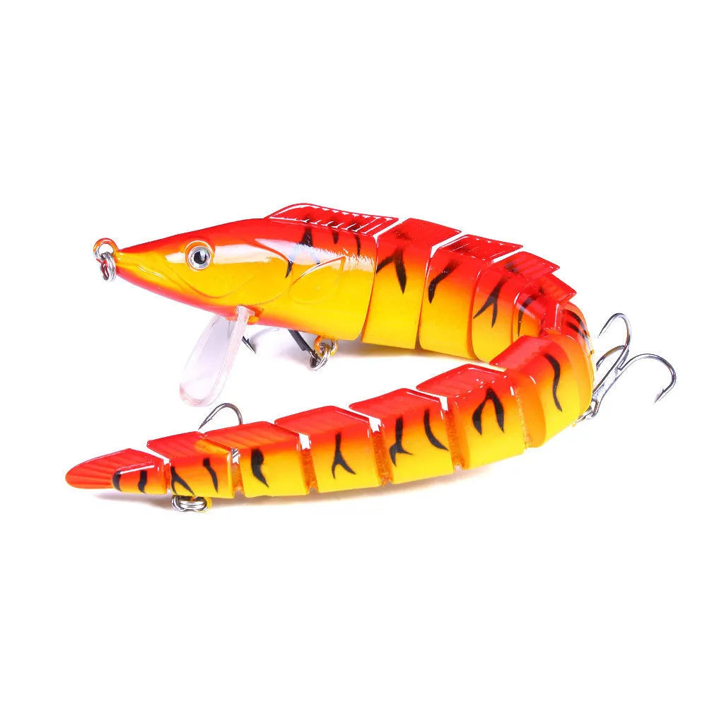 Multi-section soft plastic loach fishing lure showing articulated design and natural colour pattern