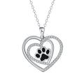 Women's dog paw print pendant necklace with electroplated copper finish on a cross chain.