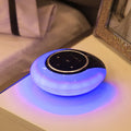Blue Bluetooth speaker LED desk lamp with touch controls and folding design on wooden desktop
