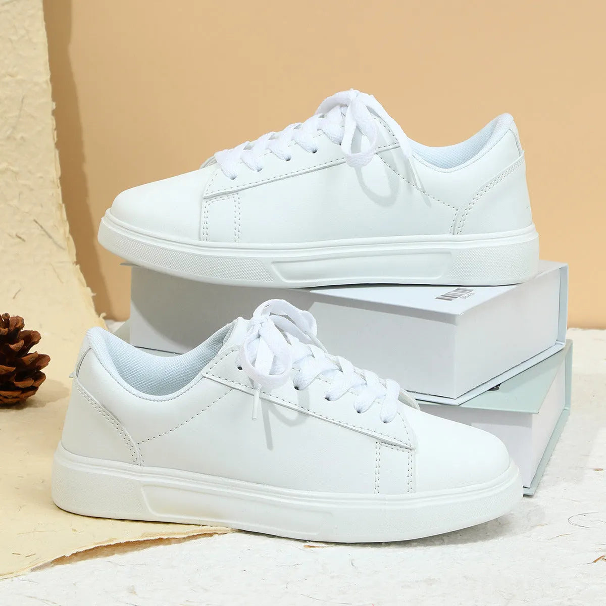 Platform skateboard sneakers in beige brown with cross strap and rubber sole