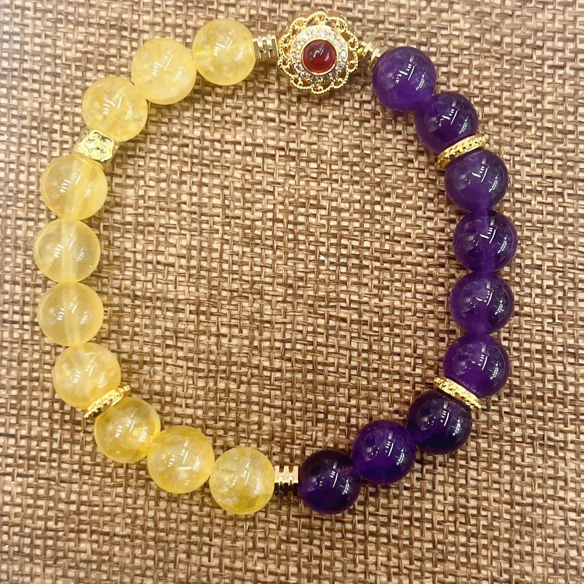 Handmade women's amethyst crystal bracelet with yellow and purple colour combination