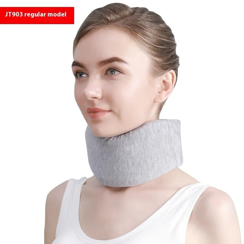 White PP plastic neck brace for cervical spine support on a neutral background.