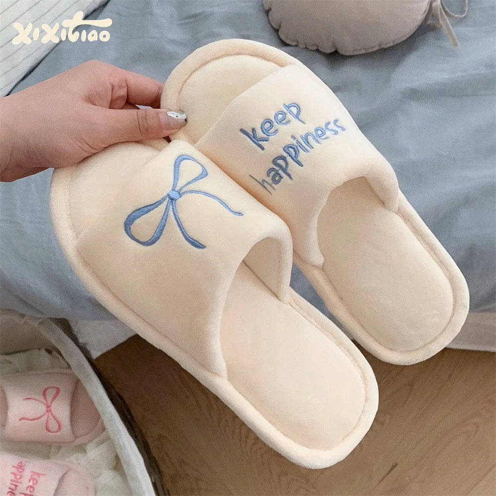 Ladies cotton slippers with bow and English letter pattern in beige yellow colour flat bottom