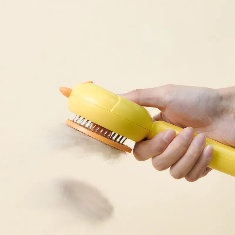Purple self-cleaning pet grooming brush with stainless steel bristles on a white background.