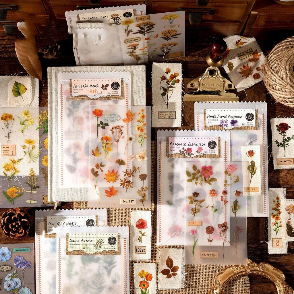 Huazhisen Series sticker material pack showing forest label designs on transfer paper and cotton linen sheets