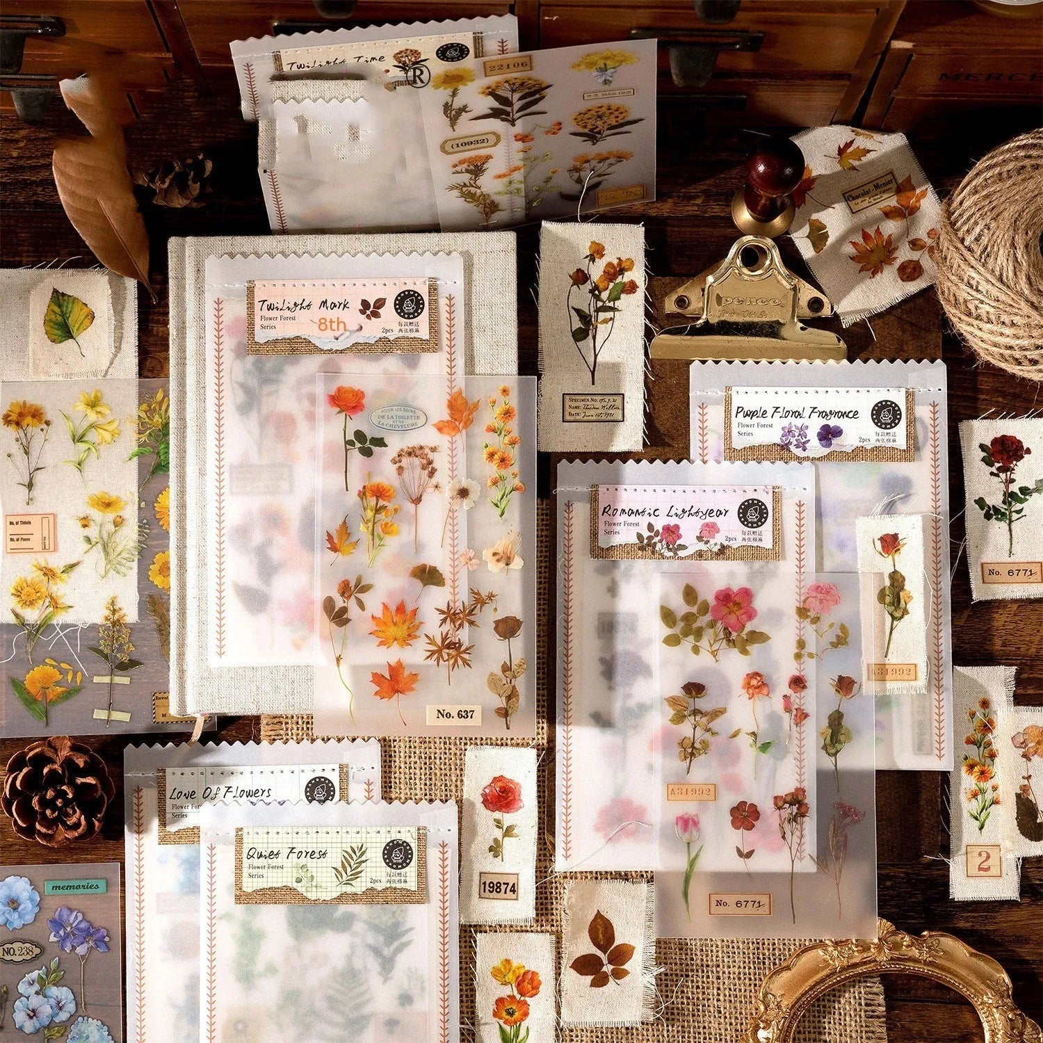 Huazhisen Series sticker material pack showing forest label designs on transfer paper and cotton linen sheets