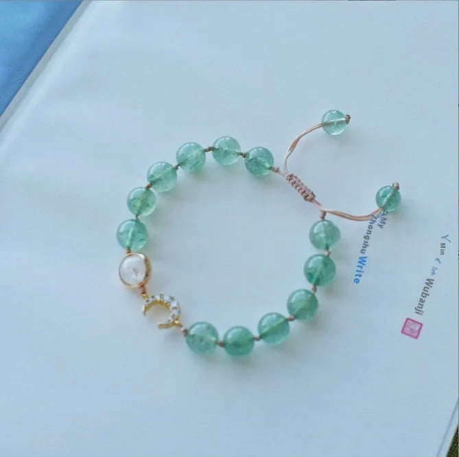 Handcrafted strawberry quartz crystal bracelet for women with natural style and multiple charm options