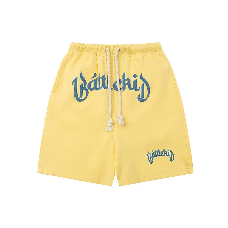Loose fit cropped sweatpants in cotton-blended fabric on hanger, showing street style design