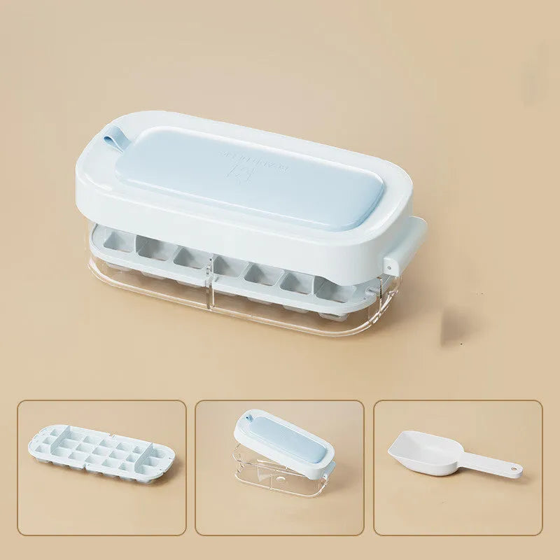Blue food-grade plastic ice cube tray with grid design and integrated ice shovel storage.