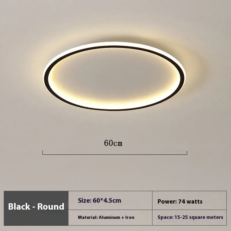 Minimalist circular ceiling lamp in black finish with dimmable LED lighting and three colour temperature options