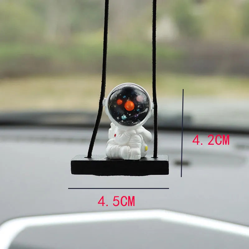 Resin car pendant with cartoon astronaut designs for vehicle interior decoration