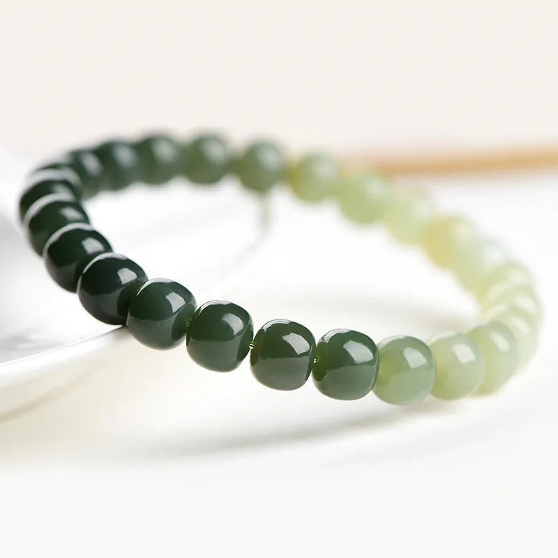 Hetian Jade Water Gradient Bracelet with polished oval beads in clear water colour.