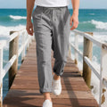Men's linen casual trousers in straight leg style with drawstring waist in light khaki colour