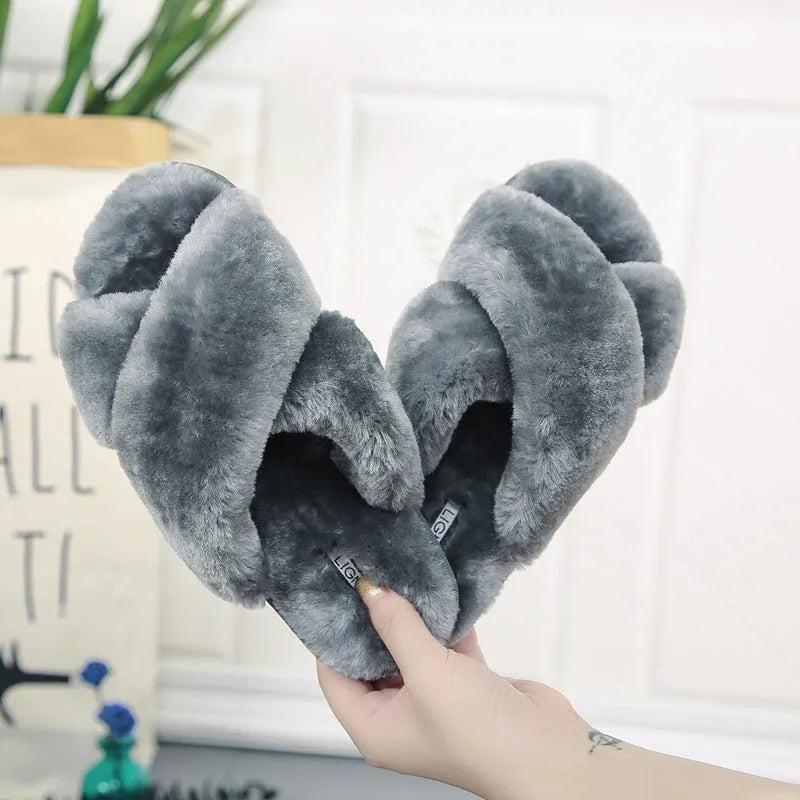 Cross open-toe fur slippers in various colours on a non-slip patterned rubber sole.
