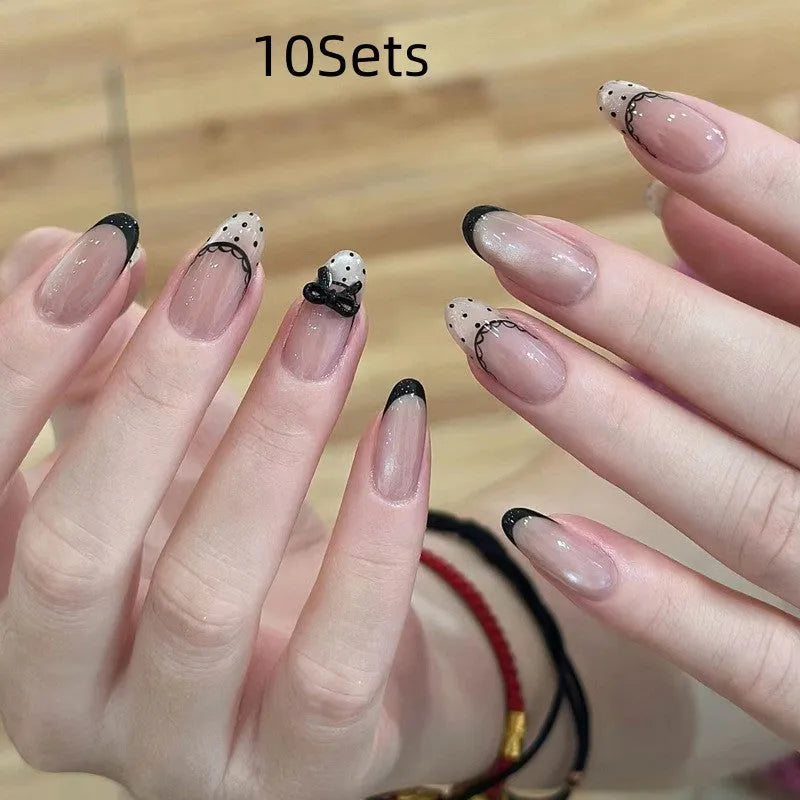 False nails with gel polish finish in assorted colours and patterns