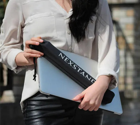 Black folding portable laptop stand made of reinforced nylon, shown folded and unfolded.