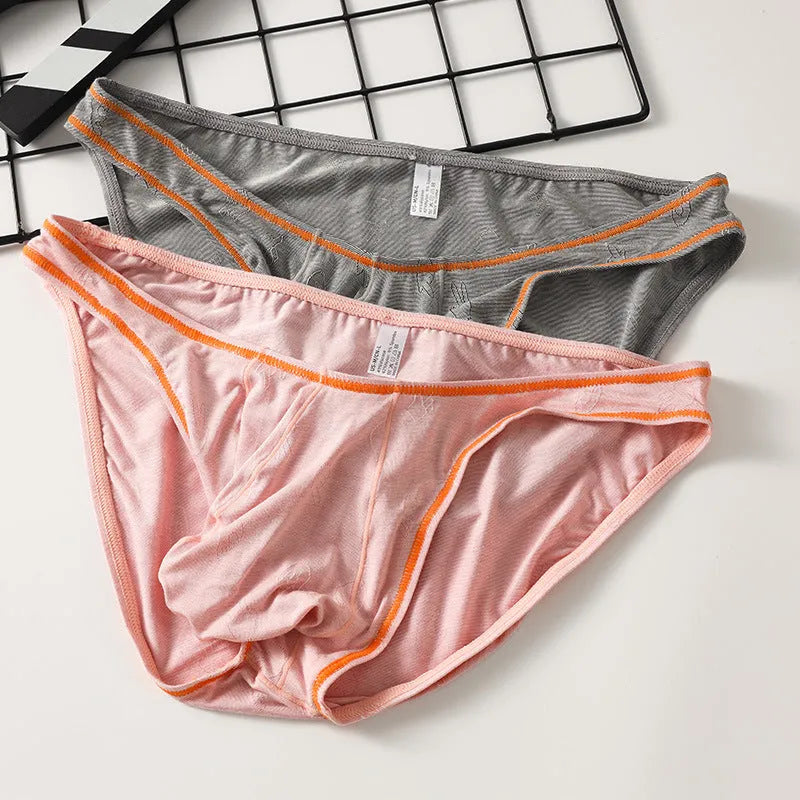 Men's modal ice silk butt-lift hip underwear in dark grey, shown flat