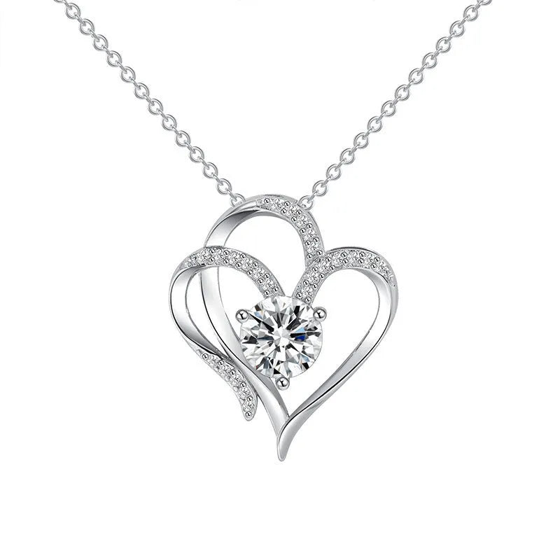 Women's heart-shaped silver necklace shown in rose gold, white gold, and yellow gold plating variations.