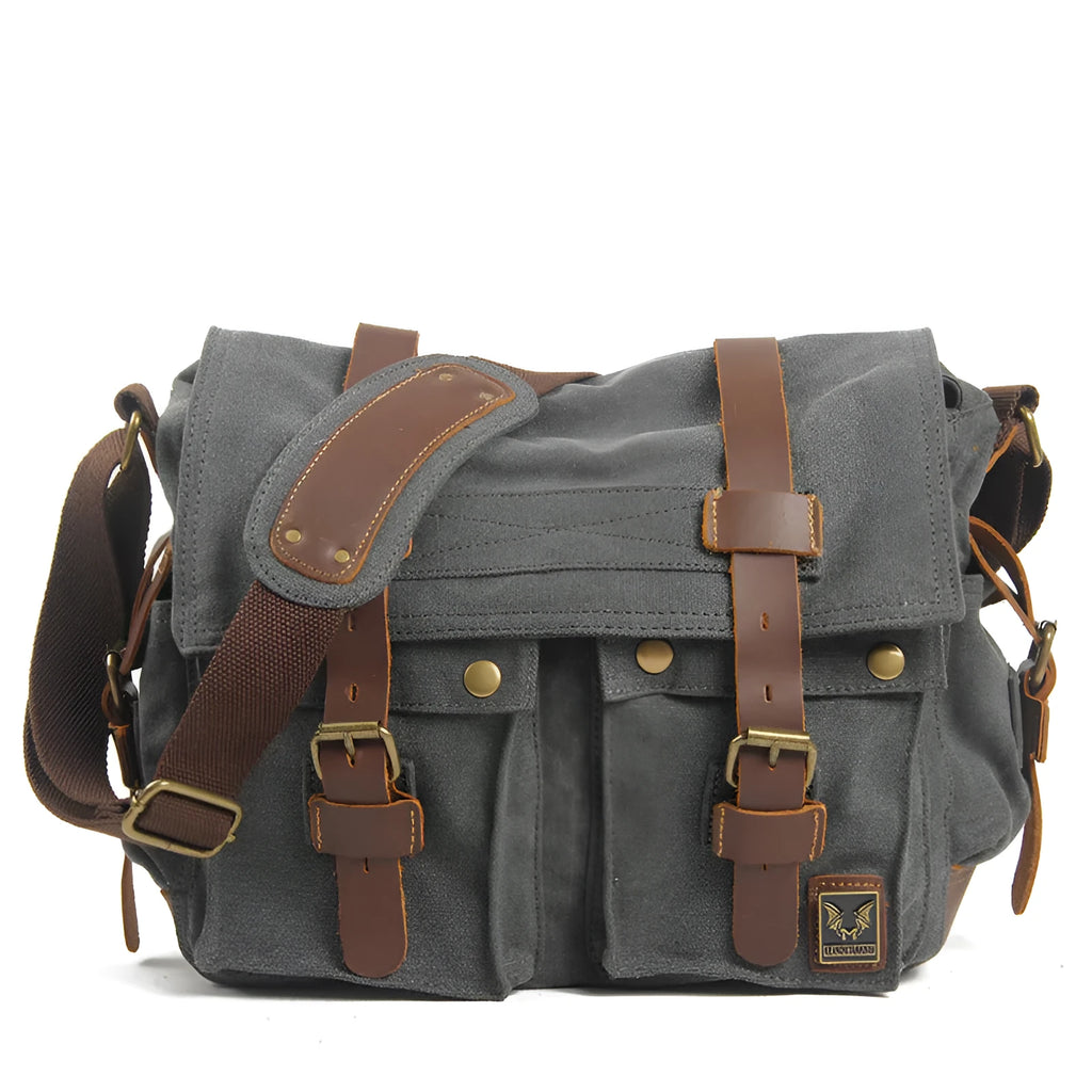 Men's brown retro canvas crossbody bag with a flap closure and a single shoulder strap.