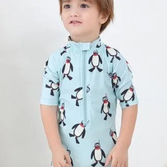 Boys' penguin print long-sleeve one-piece swimsuit with matching swimming cap