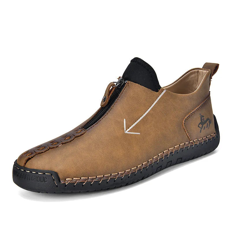 Men's black leather zip-up boots with hand-stitched detailing and round toe