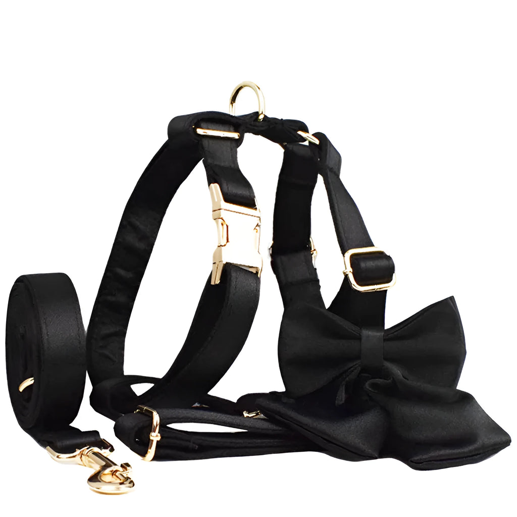 Cloth dog collar, leash, bow, and vest set shown in multiple sizes for pets.
