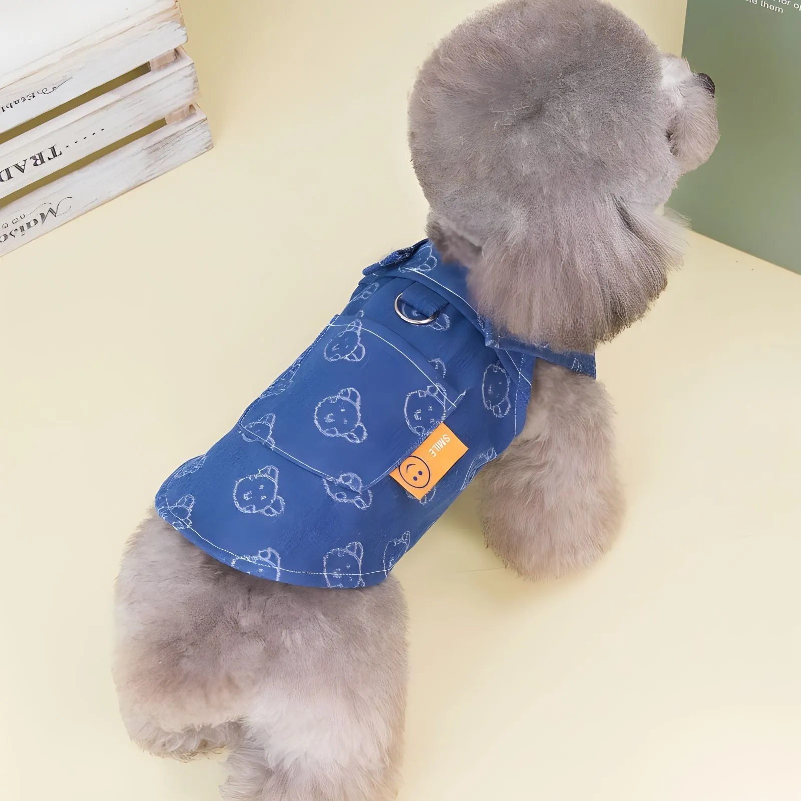 Denim princess dress for small dog on hanger showing bracket skirt style