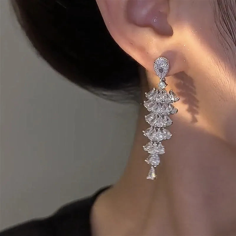 Silver pagoda Christmas tree drop earrings with sparkling zircon stones and copper construction