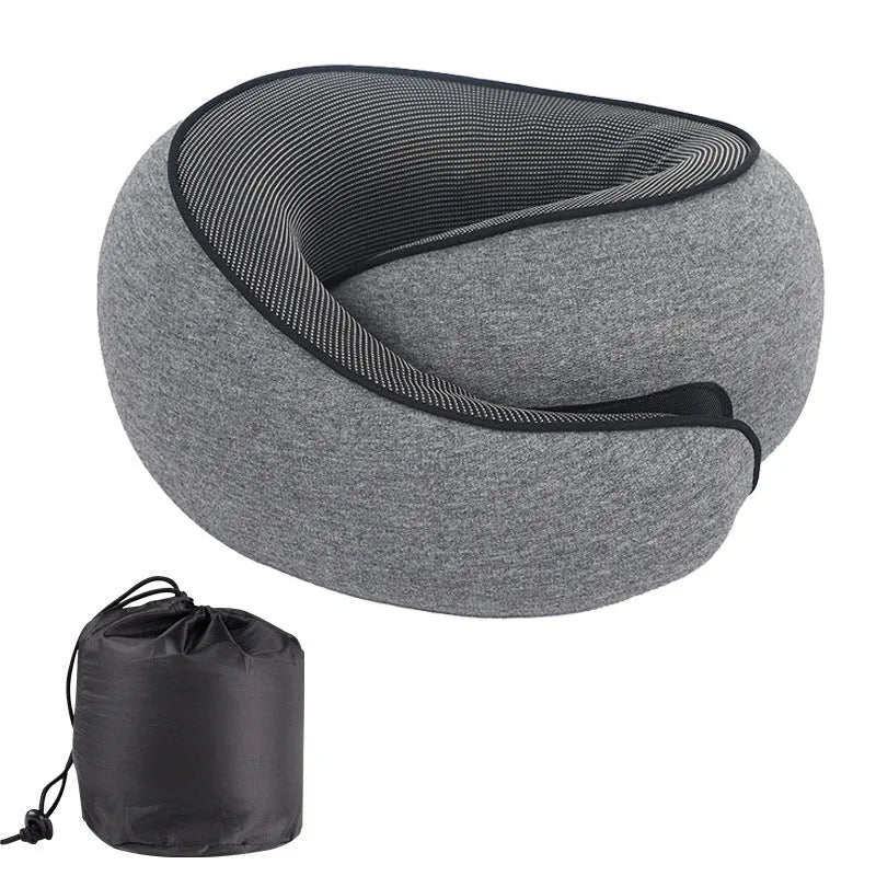 Black U-shaped memory foam travel neck pillow with storage bag, shown next to dark blue and grey colour options.