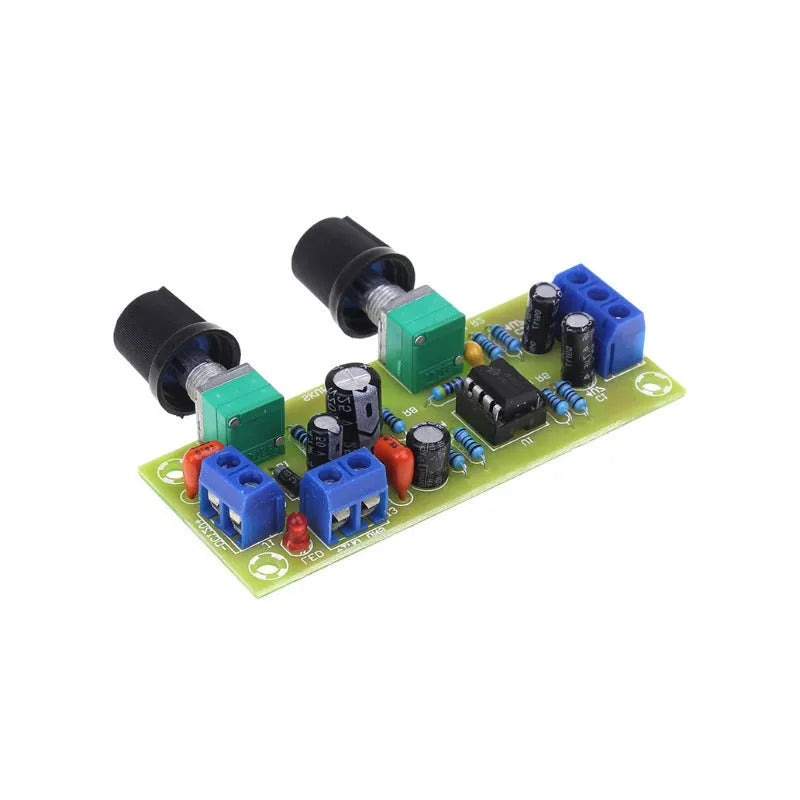Front stage bass boost circuit board with components mounted on FR-4 fibreglass showing mounting holes and connections