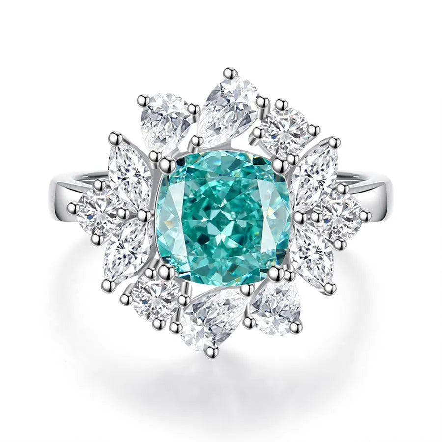 S925 silver emerald ring for women with inlaid high carbon diamonds in a geometric design on a white background.