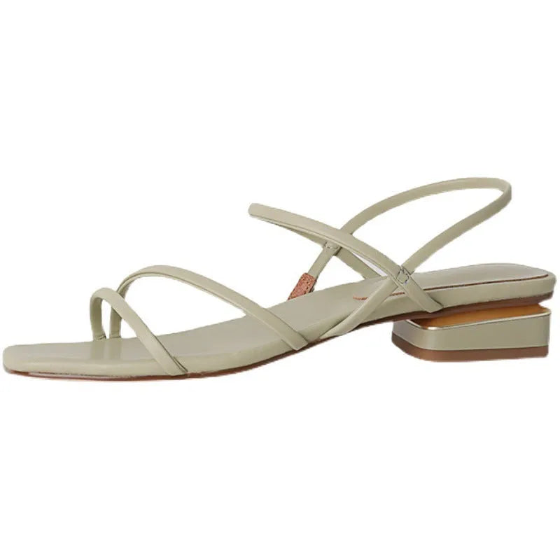 Women's flat green microfiber Roman sandals with square open toe on a white background.