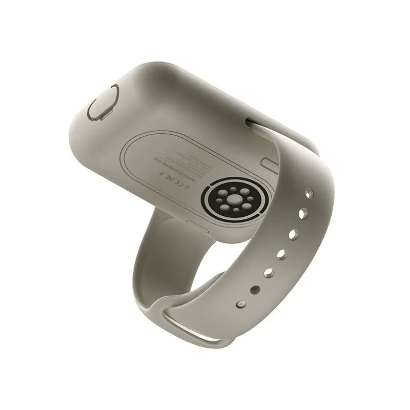 Apple Watch portable wireless charging case with silicone protector in brown, blue, and starlight colours.