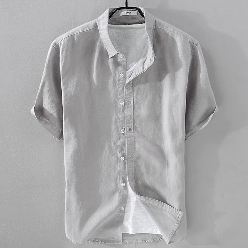 Men's light blue linen blend short sleeve shirt with loose fit on hanger
