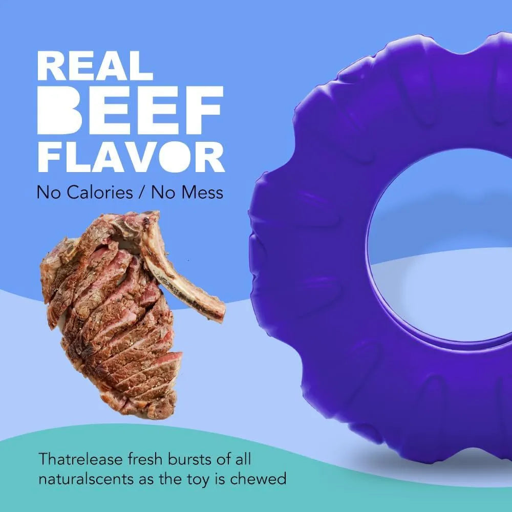 Blue rubber tyre-shaped dog chew toy with oval openings, for medium to large breed dogs.