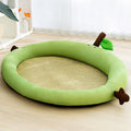 Green fruit-shaped pet bed with raised edges and cushion mat for cats and dogs