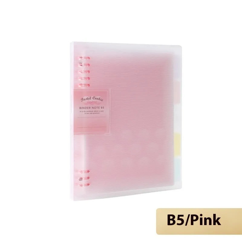 Refillable loose-leaf spiral notebook with PP cover open, showing raw wood pulp paper in grid ruling.