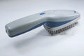 Pet grooming comb with negative ion and active oxygen purification, showing removable brush head and 78 teeth.
