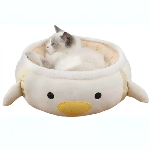 Green dinosaur and chick-shaped cat bed shown both flat as a sofa and hanging as a hammock for small pets.
