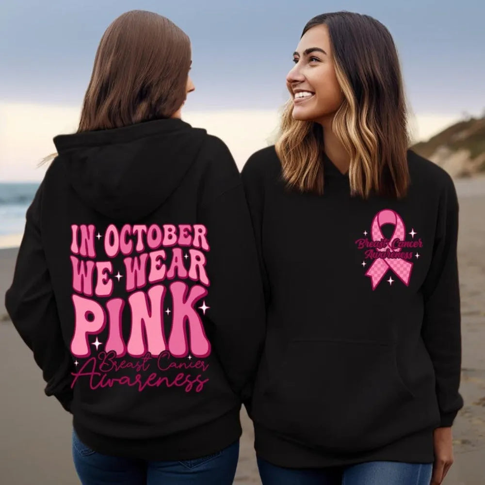 Breast cancer awareness hoodie with retro art pattern and side seam pockets in pink colour.