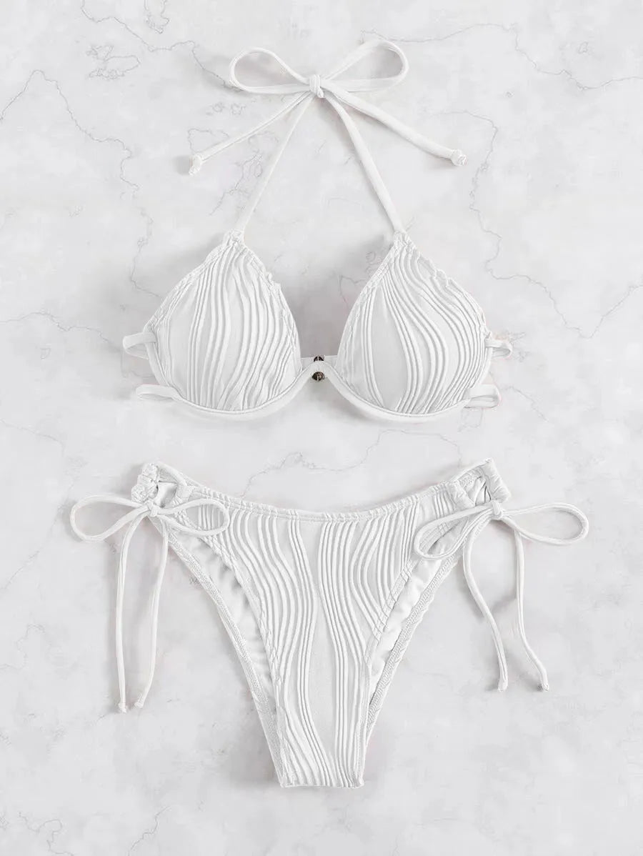 Women's apricot coloured bikini swimsuit with steel underwire bracket on a mannequin.